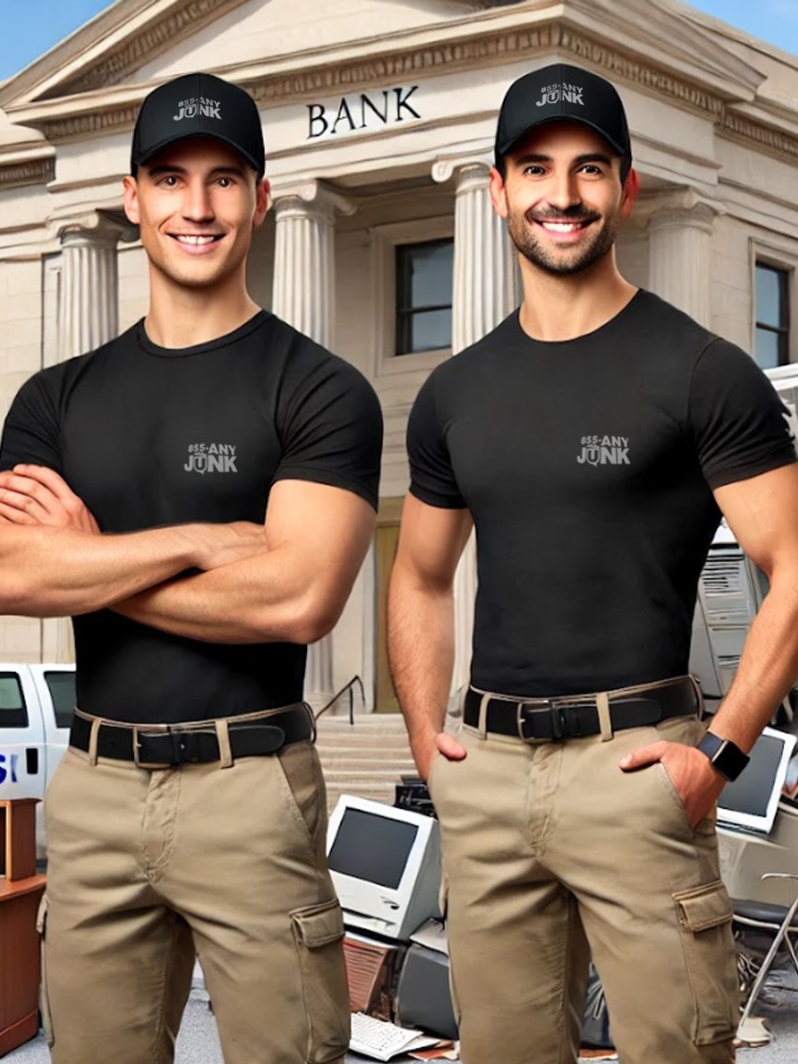 855-ANY-JUNK team removing desks and office furniture during a professional bank cleanout.