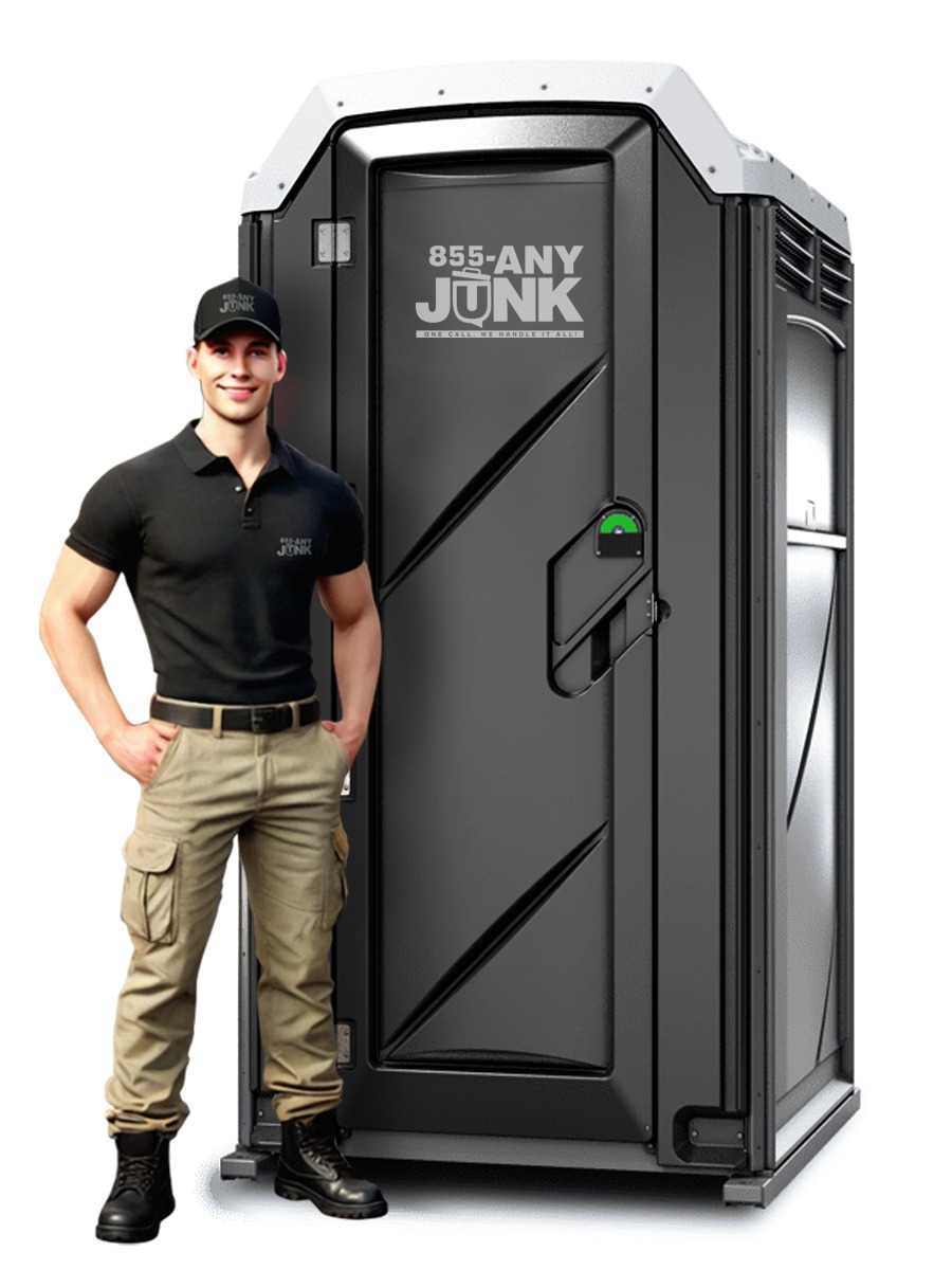 Spacious portable restroom interior with built-in sink and bright lighting.