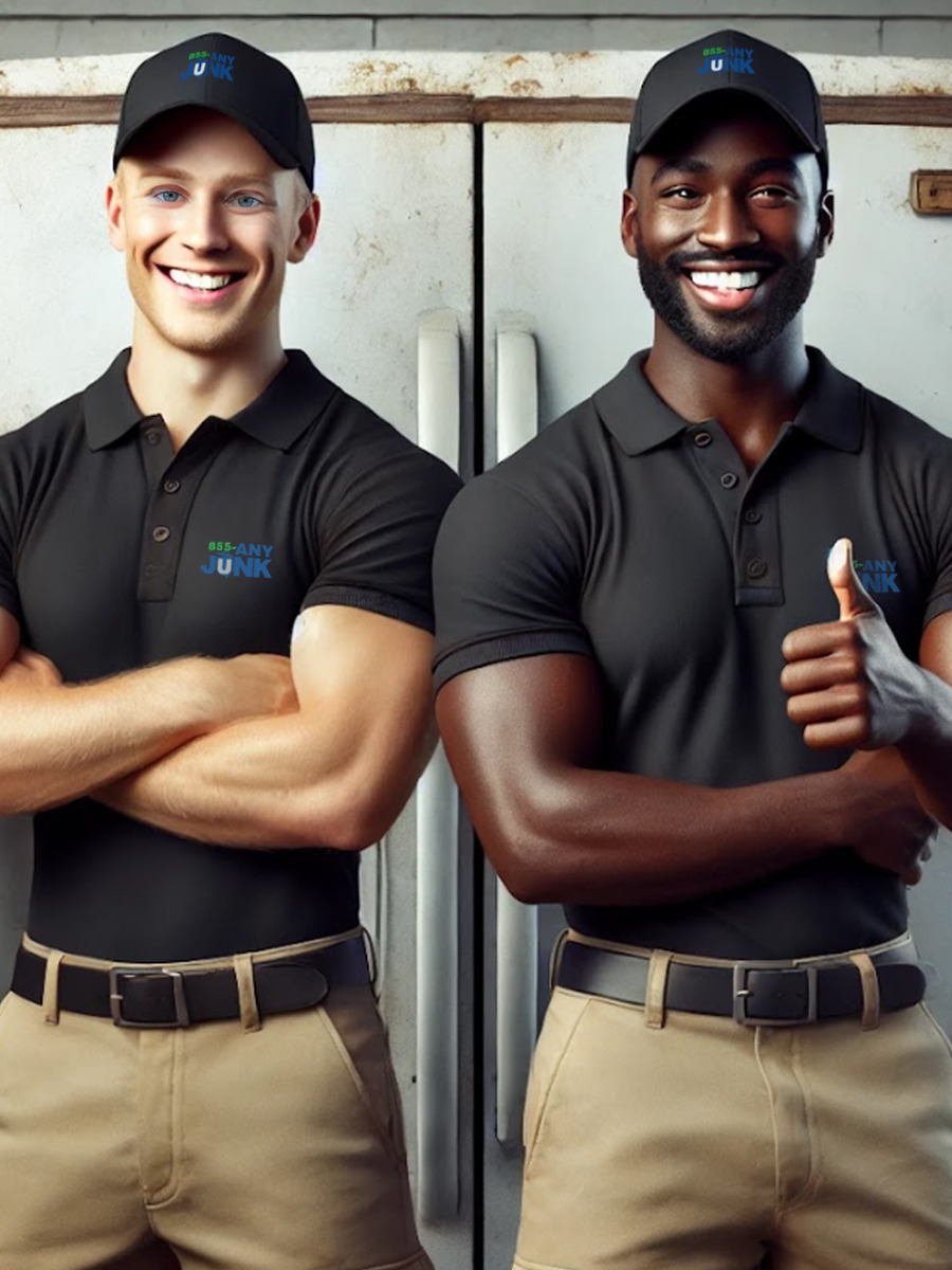 Professional team removing an old refrigerator during same-day appliance removal service.